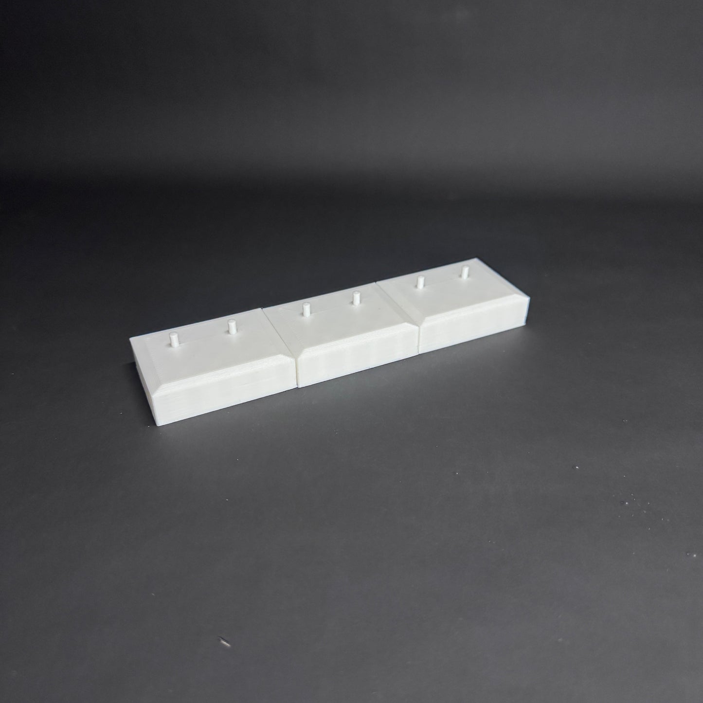 Figure Floor modular display block showing the interlocking edge design.