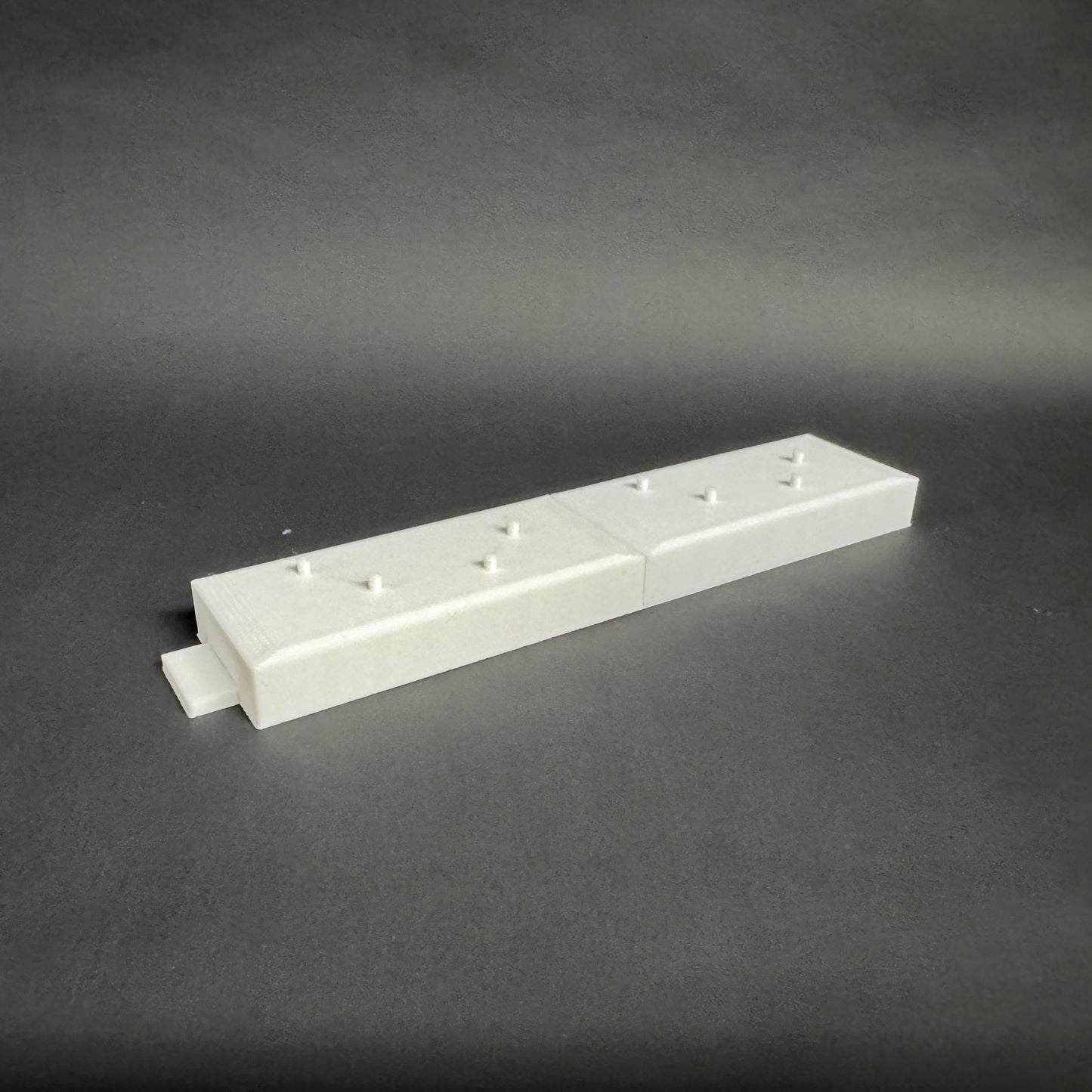 Figure Floor modular display block showing the interlocking edge design.