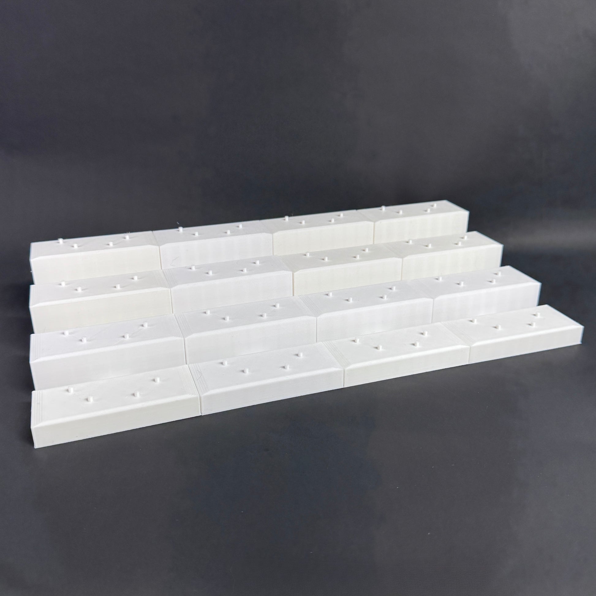 Interlocked Figure Floor bases arranged in a tiered setup